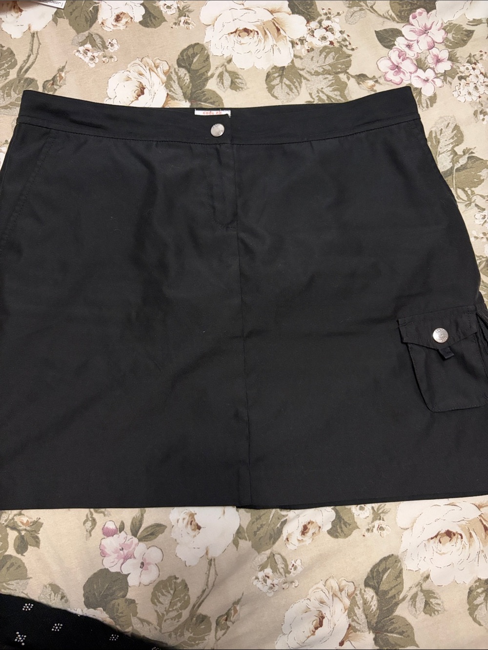 Izod Black Mini Skirt with Snap Front